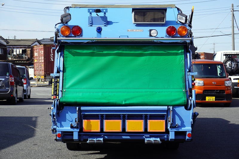 エルフ　「ワイド」　パッカー車　積載２６００ｋｇ　極東製　プレス式　６．９立米　連続動作　汚水タンク　リアロールカーテン式扉　コンテナアーム　箱上キャリア付き　フォグランプ　メッキパーツ　６速ＭＴ！ 程度良いです！2