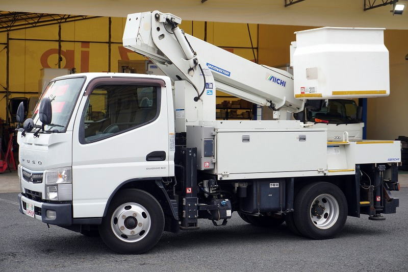 キャンター　高所作業車　アイチ製（ＳＢ１０Ａ）　最大地上高９．７ｍ　ＦＲＰバケット　バケット積載荷重２００ｋｇ　積載３００ｋｇ　工具入れ　ジョイスティックタイプ　アワーメーター：２９３５ｈ　左電格ミラー　社外ナビ　バックカメラ　フォグランプ　通信工事仕様！ＡＴ車！フロント画像
