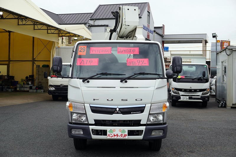 キャンター　高所作業車　アイチ製（ＳＢ１０Ａ）　最大地上高９．７ｍ　ＦＲＰバケット　バケット積載荷重２００ｋｇ　積載３００ｋｇ　工具入れ　ジョイスティックタイプ　アワーメーター：２９３５ｈ　左電格ミラー　社外ナビ　バックカメラ　フォグランプ　通信工事仕様！ＡＴ車！0