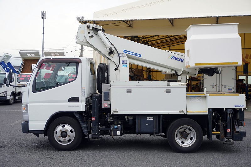 キャンター　高所作業車　アイチ製（ＳＢ１０Ａ）　最大地上高９．７ｍ　ＦＲＰバケット　バケット積載荷重２００ｋｇ　積載３００ｋｇ　工具入れ　ジョイスティックタイプ　アワーメーター：２９３５ｈ　左電格ミラー　社外ナビ　バックカメラ　フォグランプ　通信工事仕様！ＡＴ車！1