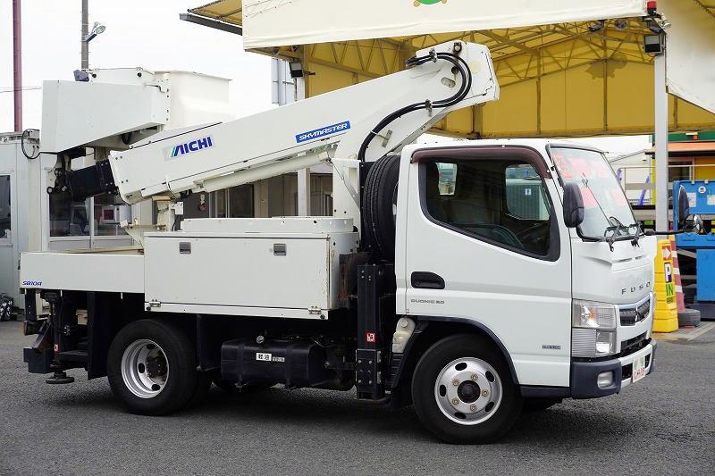 キャンター　高所作業車　アイチ製（ＳＢ１０Ａ）　最大地上高９．７ｍ　ＦＲＰバケット　バケット積載荷重２００ｋｇ　積載３００ｋｇ　工具入れ　ジョイスティックタイプ　アワーメーター：２９３５ｈ　左電格ミラー　社外ナビ　バックカメラ　フォグランプ　通信工事仕様！ＡＴ車！4