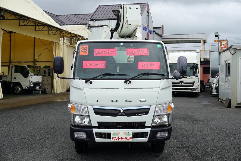 キャンター　高所作業車　アイチ製（ＳＢ１０Ａ）　最大地上高９．７ｍ　ＦＲＰバケット　バケット積載荷重２００ｋｇ　積載３００ｋｇ　工具入れ　ジョイスティックタイプ　アワーメーター：２１３５ｈ　左電格ミラー　社外ナビ　バックカメラ　フォグランプ　通信工事仕様！ＡＴ車！0