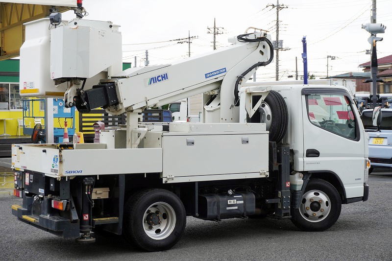 キャンター　高所作業車　アイチ製（ＳＢ１０Ａ）　最大地上高９．７ｍ　ＦＲＰバケット　バケット積載荷重２００ｋｇ　積載３００ｋｇ　工具入れ　ジョイスティックタイプ　アワーメーター：２１３５ｈ　左電格ミラー　社外ナビ　バックカメラ　フォグランプ　通信工事仕様！ＡＴ車！6
