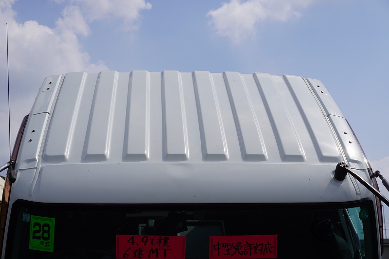 ファイター　増トン　「ワイド　ベッド付」　重機運搬車　タダノ製ハイジャッキ　美川ボディー製造りボディー　積載４９００ｋｇ　ウインチ　ラジコン　アユミ板掛け　アルミブロック　アオリ上部プロテクター付き　三方開　鳥居ラダー＆下部シマ板張り　床フック　アルミホイール　メッキパーツ　社外ナビ　フルセグＴＶ　ＥＴＣ　バックカメラ　坂道発進補助　６速ＭＴ！中型免許対応！希少車！！　車検「Ｒ８年２月まで！」25