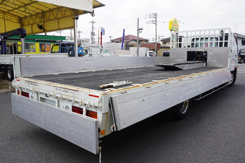 ファイター　増トン　「ワイド　ベッド付」　重機運搬車　タダノ製ハイジャッキ　美川ボディー製造りボディー　積載４９００ｋｇ　ウインチ　ラジコン　アユミ板掛け　アルミブロック　アオリ上部プロテクター付き　三方開　鳥居ラダー＆下部シマ板張り　床フック　アルミホイール　メッキパーツ　社外ナビ　フルセグＴＶ　ＥＴＣ　バックカメラ　坂道発進補助　６速ＭＴ！中型免許対応！希少車！！　車検「Ｒ８年２月まで！」36