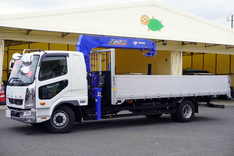 (未使用) ファイター 増トン 「ワイド ベッド付き」 5段クレーン 積載7200kg タダノ製 6m長 アルミブロック ラジコン フックイン 2.93t吊 角足 差し違いアウトリガー ETC2.0 坂道発進補助 オートエアコン リーフサス メッキパーツ多数!6速MT!フロント画像