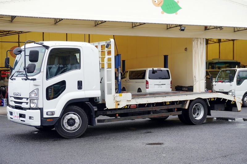 フォワード 増トン 「標準幅 ベッド付」 重機運搬車 本所ボディー製 積載8800kg アユミ板掛け&アユミ板付き 鳥居Jフック&下部鉄板張り&ラダー スタンション穴 網工具入れ LED作業灯 ETC 坂道発進補助 低走行!6速MT!希少車!!フロント画像