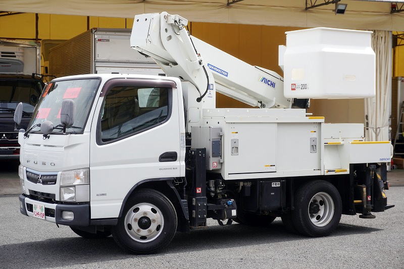 キャンター　高所作業車　アイチ製（ＳＢ１０Ａ）　最大地上高９．７ｍ　ＦＲＰバケット　バケット積載荷重２００ｋｇ　積載２５０ｋｇ　工具入れ　ジョイスティックタイプ　アワーメーター：１３４５ｈ　左電格ミラー　社外ナビ　バックカメラ　フォグランプ　通信工事仕様！ＡＴ車！