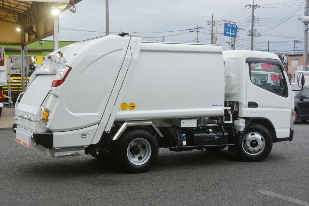 （未使用）　キャンター　パッカー車　プレス式　新明和製　積載２０００ｋｇ　４．３立米　連続動作　汚水タンク　作業灯　左電格ミラー　キーレス　防臭扉　５速ＭＴ！　車検付「令和５年４月」まで！6