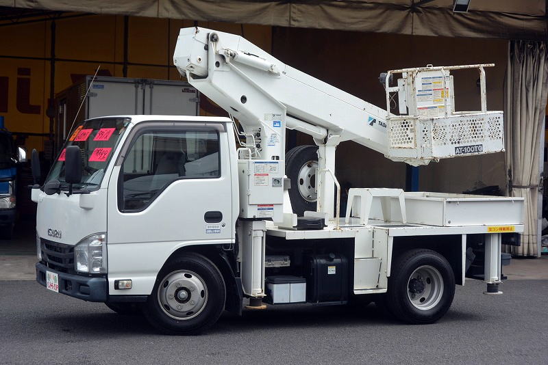 エルフ　高所作業車　タダノ製（ＡＴ－１００ＴＧ）　最大地上高９．９ｍ　鉄製バケット　バケット積載荷重２００ｋｇ　積載５００ｋｇ　ブーム自動格納　ジャッキ自動張り出し　ジョイスティックタイプ　ＡＣ１００Ｖ　坂道発進補助　左電格ミラー　ＥＴＣ　アワーメーター１２０４ｈ　６速ＭＴ！ フロント画像